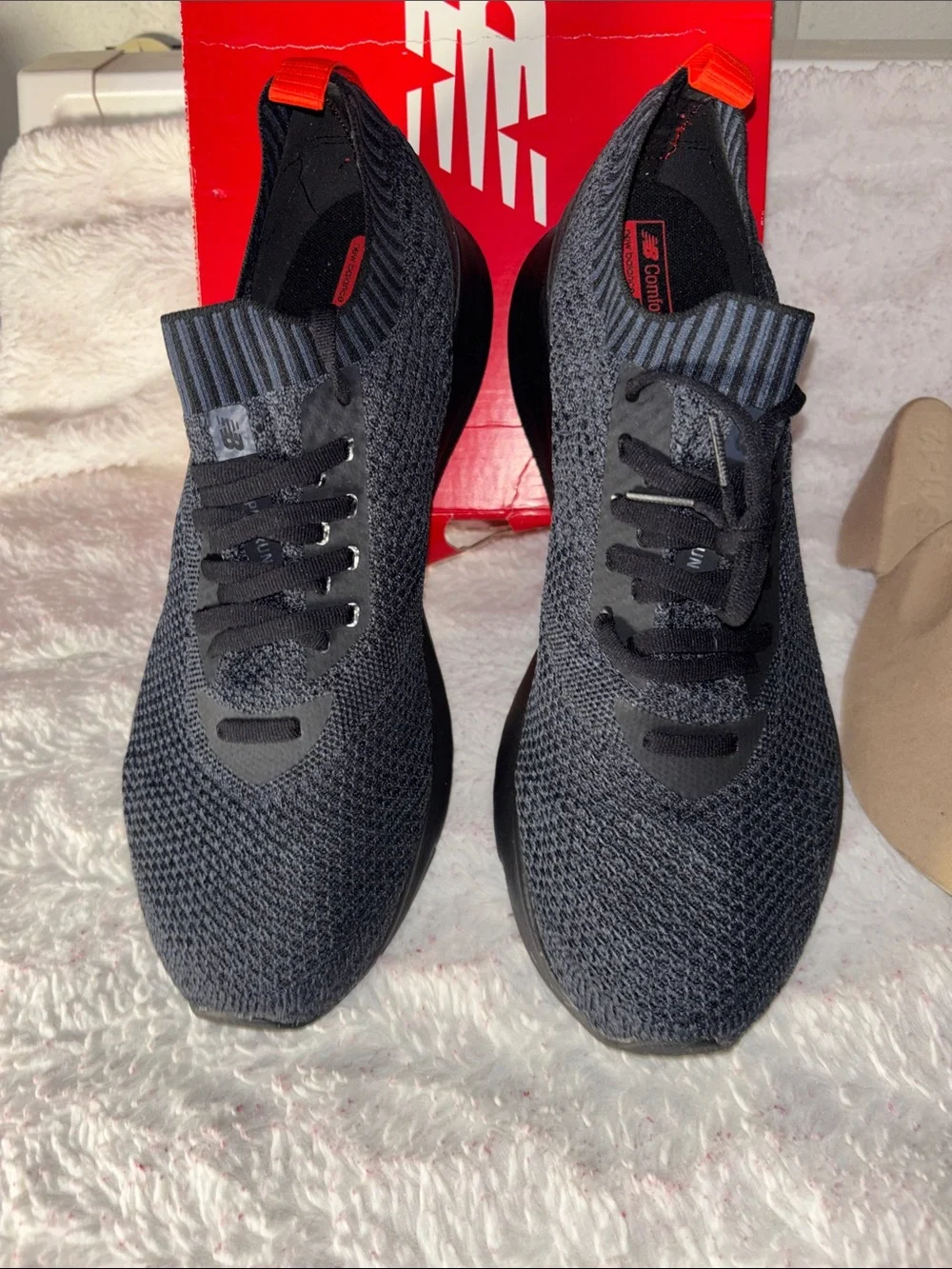New Balance Men's Black Knit Athletic Sneakers with Red Heel Tab